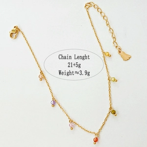 Gold stainless steel bracelet featuring vibrant multi-colored beads and lobster clasp