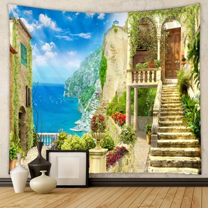 Detail of Mediterranean landscape tapestry showing seaside village scenery on white wall