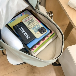 Mint green nylon backpack with large capacity and multi-functional internal compartments