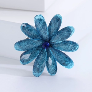 Elegant blue acrylic flower brooch with transparent petals and central rhinestone