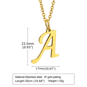Detail view of gold letter A pendant necklace with size and material specifications