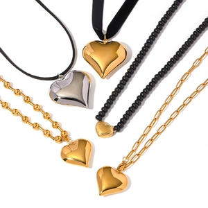 Modern heart pendant necklace set in gold and silver finish with varied chain styles