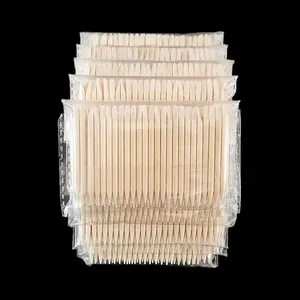 Double-headed orange wood sticks for nail art and cuticle removal in bulk packaging