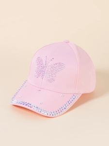 Close-up of pink cotton baseball cap with glittering rhinestone butterfly pattern