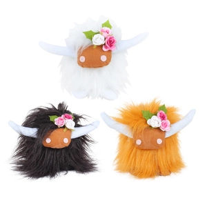 Three highland cow plush toys in black, white, and brown with cute floral decorations