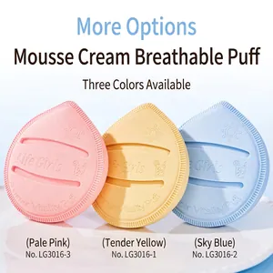 Three teardrop Rubycell makeup puffs in pastel colors on a white decorative tray
