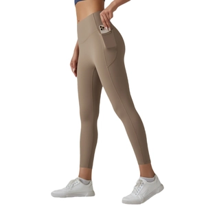 High-waisted seamless yoga pants with side pockets in earth-tone brown for fitness