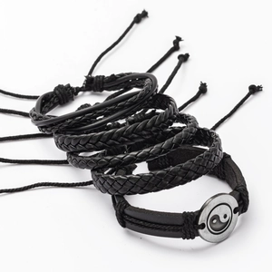 Men's multi-layer braided leather bracelet set with metallic Yin Yang symbol charm