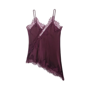 Detail of dark purple satin camisole with delicate eyelash lace trim and irregular hem