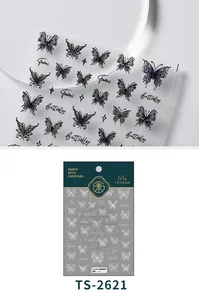 Close-up of TS-2621 3D embossed butterfly nail stickers with purple floral patterns