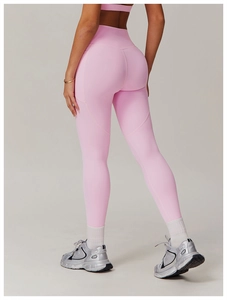 Detailed back view of pink high-waisted yoga pants with heart-shaped seams and side pockets