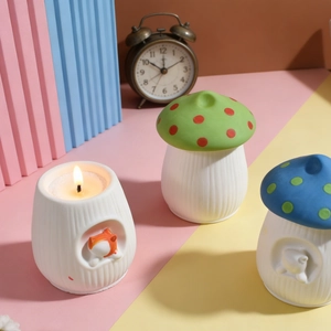 Detail of mushroom ceramic candle jars with cute 3D animals and colorful textured lids
