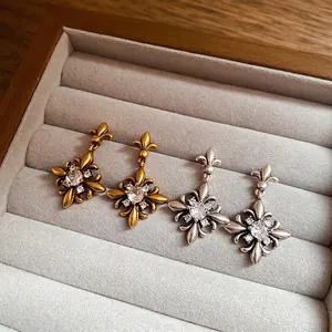 Vintage zircon iris flower stud earrings in antique gold and silver finishes