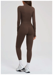 Back view of a sleek brown high-waist yoga set with body-sculpting athletic fabric