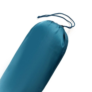 Detail view of teal nylon drawstring closure for versatile yoga mat carrier bag
