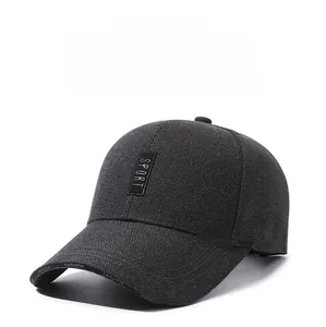 Detailed view of dark grey baseball cap showing Sport badge and Fashion printed brim