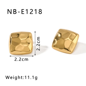 Detail view of gold square hammered stud earrings with size and weight measurements
