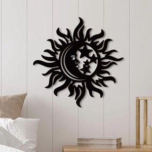 Bohemian wooden wall decor featuring sun moon and stars in matte black finish