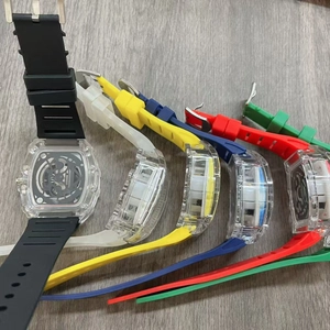 Top view of five tonneau shaped watches with transparent cases and colorful rubber straps