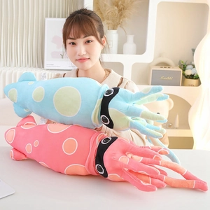 Detailed view of plush octopus toys with polka dots and long tentacles in a home setting