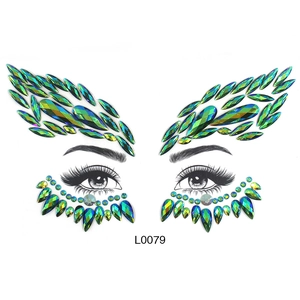 Teal and green rhinestone face jewels with symmetrical eye design, model L0079