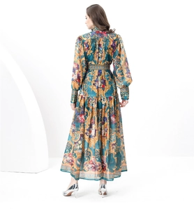Detailed back view of vintage baroque print maxi dress with voluminous tiered hemline