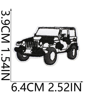 Detailed view of black and white off-road vehicle embroidery patch with size dimensions