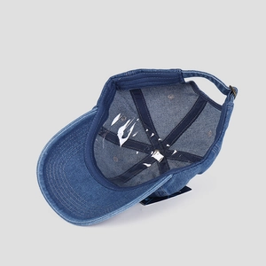 Dark blue denim baseball cap with adjustable metal buckle and internal printed lining