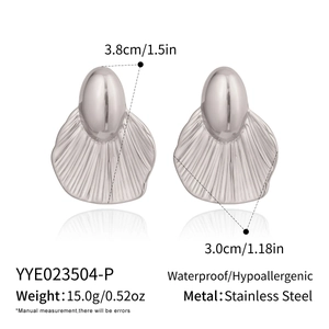 Macro view of geometric shell earrings in stainless steel with waterproof specs