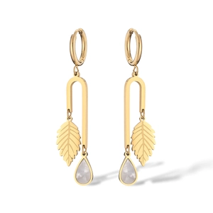 Detail view of gold-plated leaf earrings with shell drop and polished titanium steel u-shape