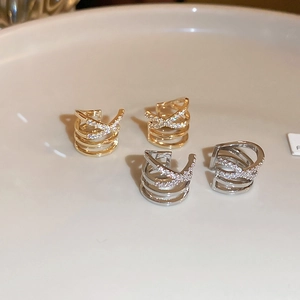 Crossed zircon ear bone clips in gold and silver finish with multi-layer geometric design