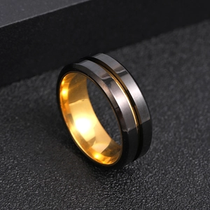 Rotatable stainless steel ring in black matte and gold finish shown at a 45-degree angle