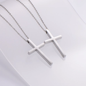 Polished stainless steel 3D cross pendant necklaces for men in a minimalist punk style