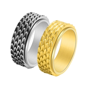Gold and silver stainless steel dragon scale spinner rings for men featuring rotatable bands