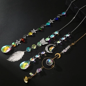 Set of 4 crystal suncatchers with moon and star metal charms and prism balls for garden decor