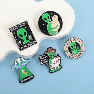5-piece set of funny green alien enamel pins featuring UFO and cow cat designs
