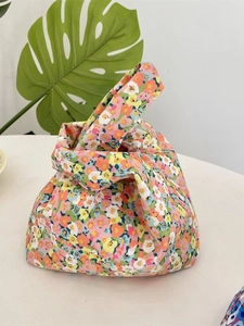 Floral corduroy knot wrist bag with colorful patterns for daily use and travel
