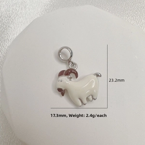 Macro view of cute enamel goat pendant with dimensions 23.2mm by 17.3mm for jewelry