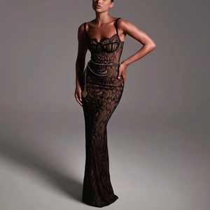 Detail showing lace texture and metallic chain belt on a slim black maxi dress