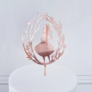 Rose gold acrylic cake topper with girl silhouette and Happy Birthday script on cake