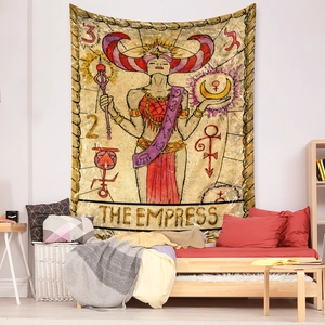 Detail of The Empress tarot tapestry hanging above a bed for aesthetic room decoration