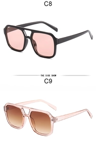 Detail view of square double bridge sunglasses showing C8 black and C9 pink frames
