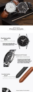 Detail view of quartz business watch with Roman numerals and leather strap