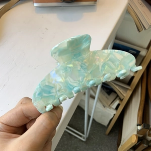 Mint green and white marble acetate hair claw clip for thick hair styling