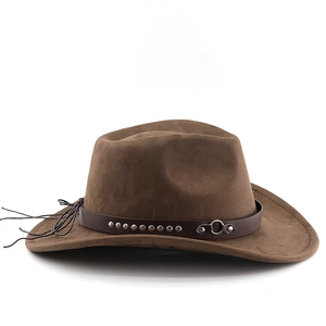 Close-up of brown suede cowboy hat with leather band, silver studs and tassel detail