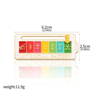 Detail of sliding arrow indicator on social battery enamel pin showing 6.2cm dimensions
