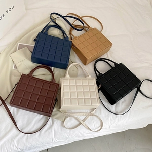Chic quilted square handbag in five colors with top handle and crossbody strap