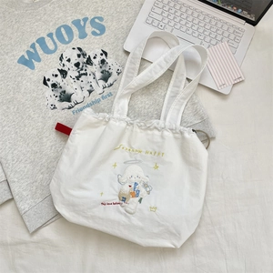 Detailed embroidery of cartoon character and happy text on white canvas drawstring bag