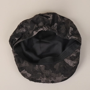Asymmetrical distressed camouflage newsboy cap with vintage ripped details and inner lining