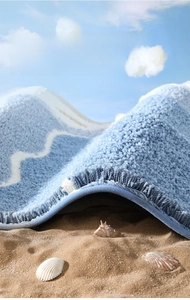 Detailed close-up of blue wave pattern plush bath mat with thick fiber texture